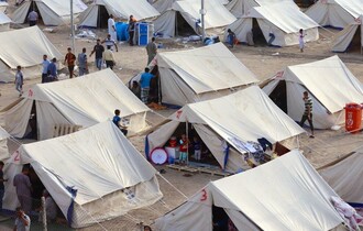 العراق ينقل الدفعة الرابعة من مواطنيه المحتجزين في مخيم الهول شرقي سوريا